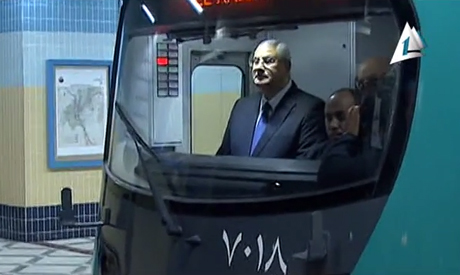 Interim President Adly Mansour on a trip to nowhere, May 7, 2014.